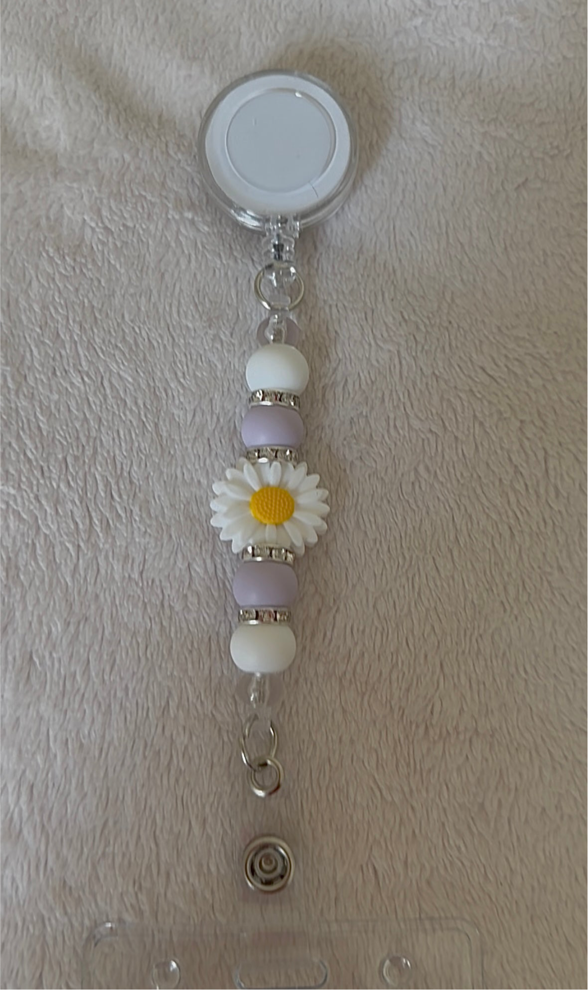 Daisy retractable ID holder