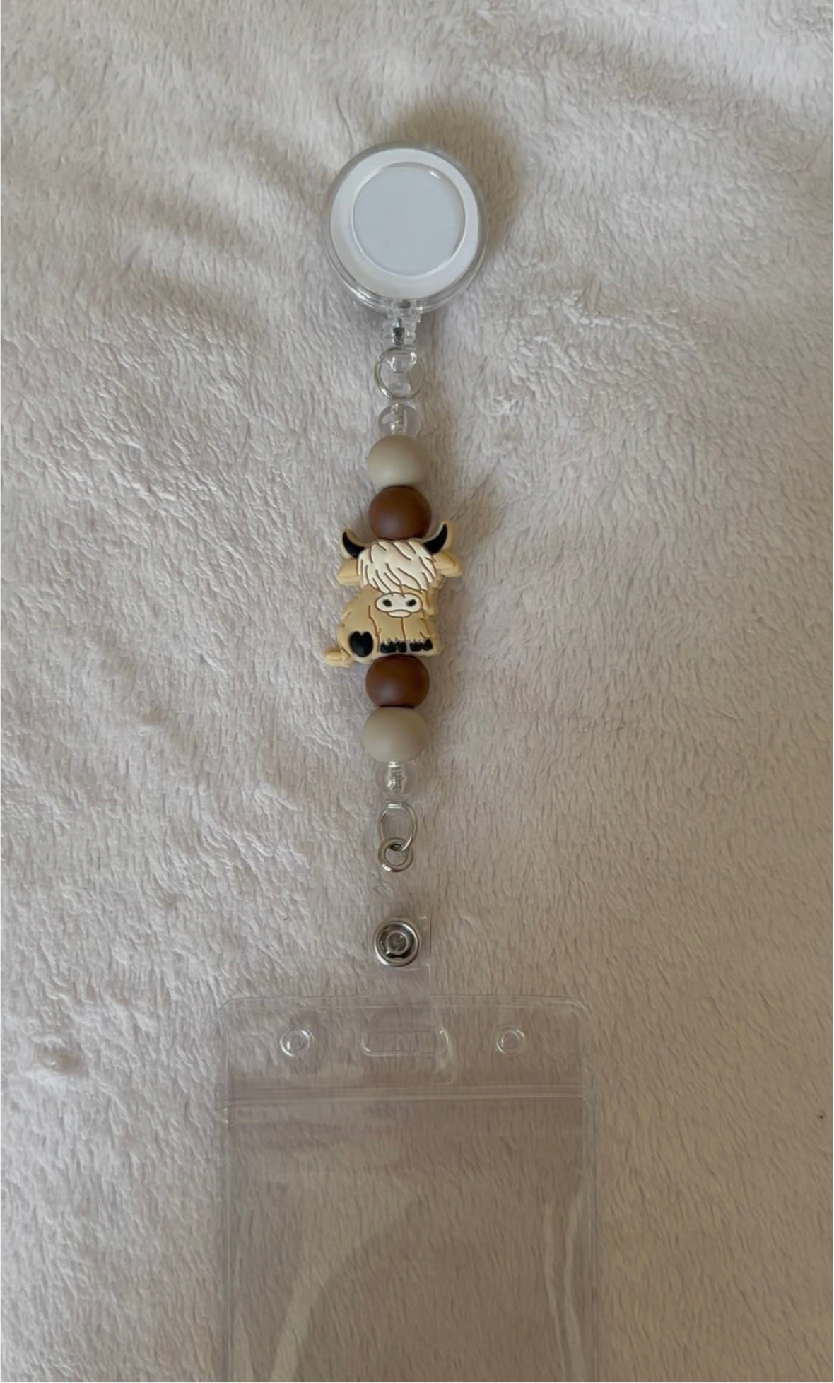 Nude cow retractable ID holder