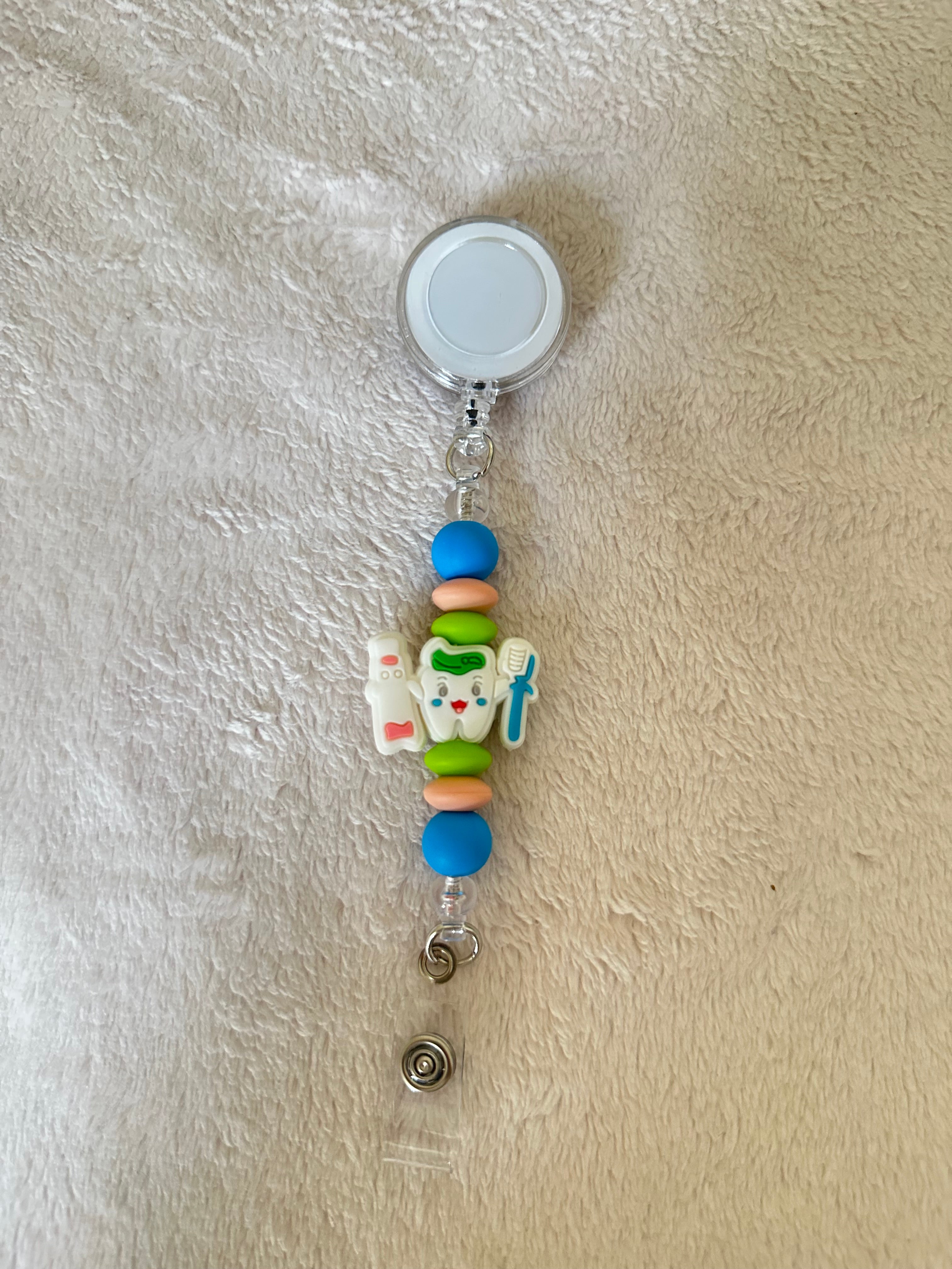 Dental retractable ID holder