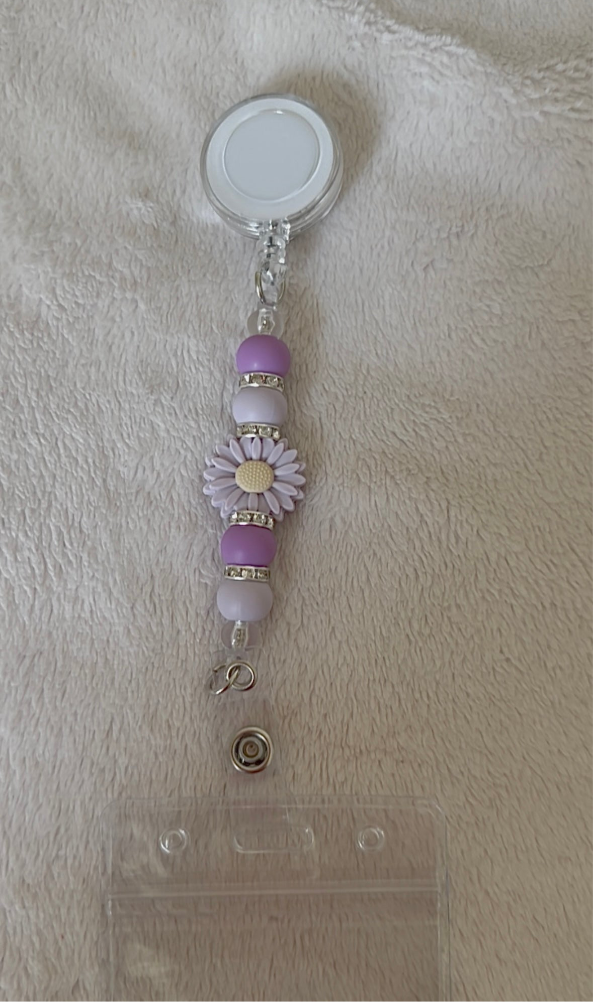 Purple daisy retractable ID holder