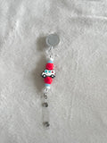 Ambulance retractable ID holder