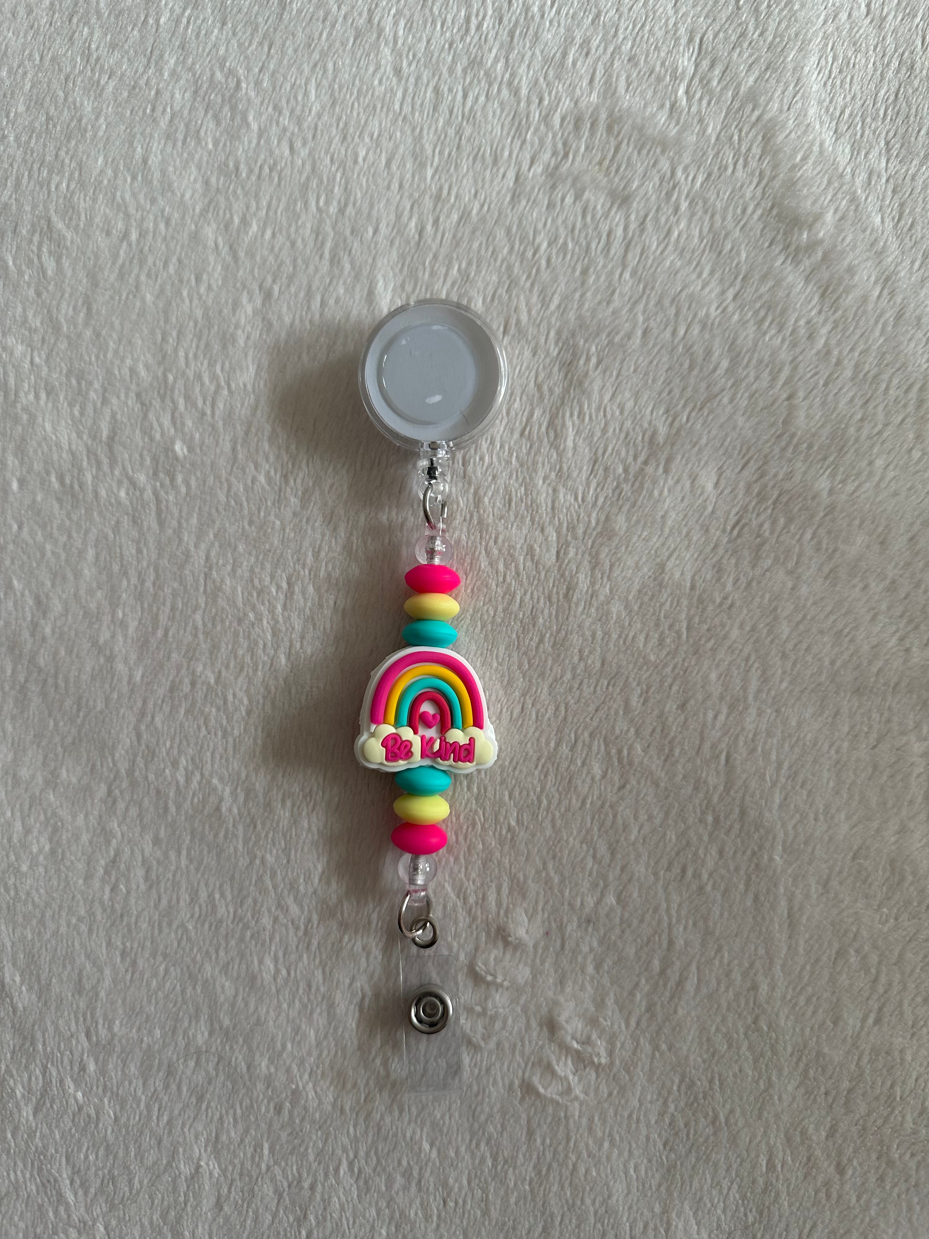 Rainbow be kind retractable ID holder