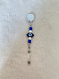 Evil eye retractable ID badge