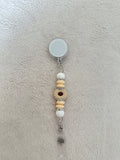 Floral nude retractable ID holder