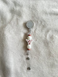 Cow retractable ID holder
