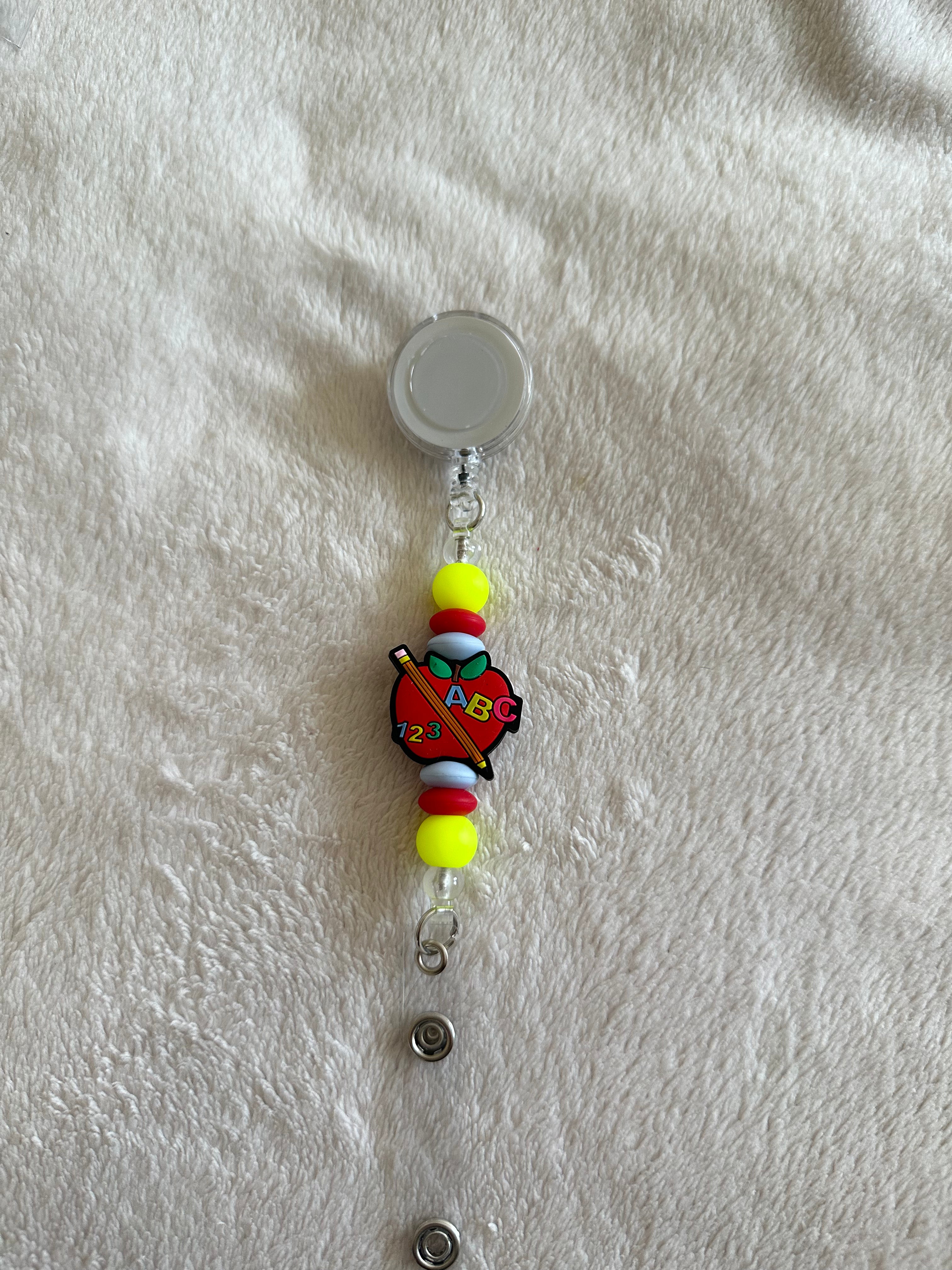 Abc retractable ID holder