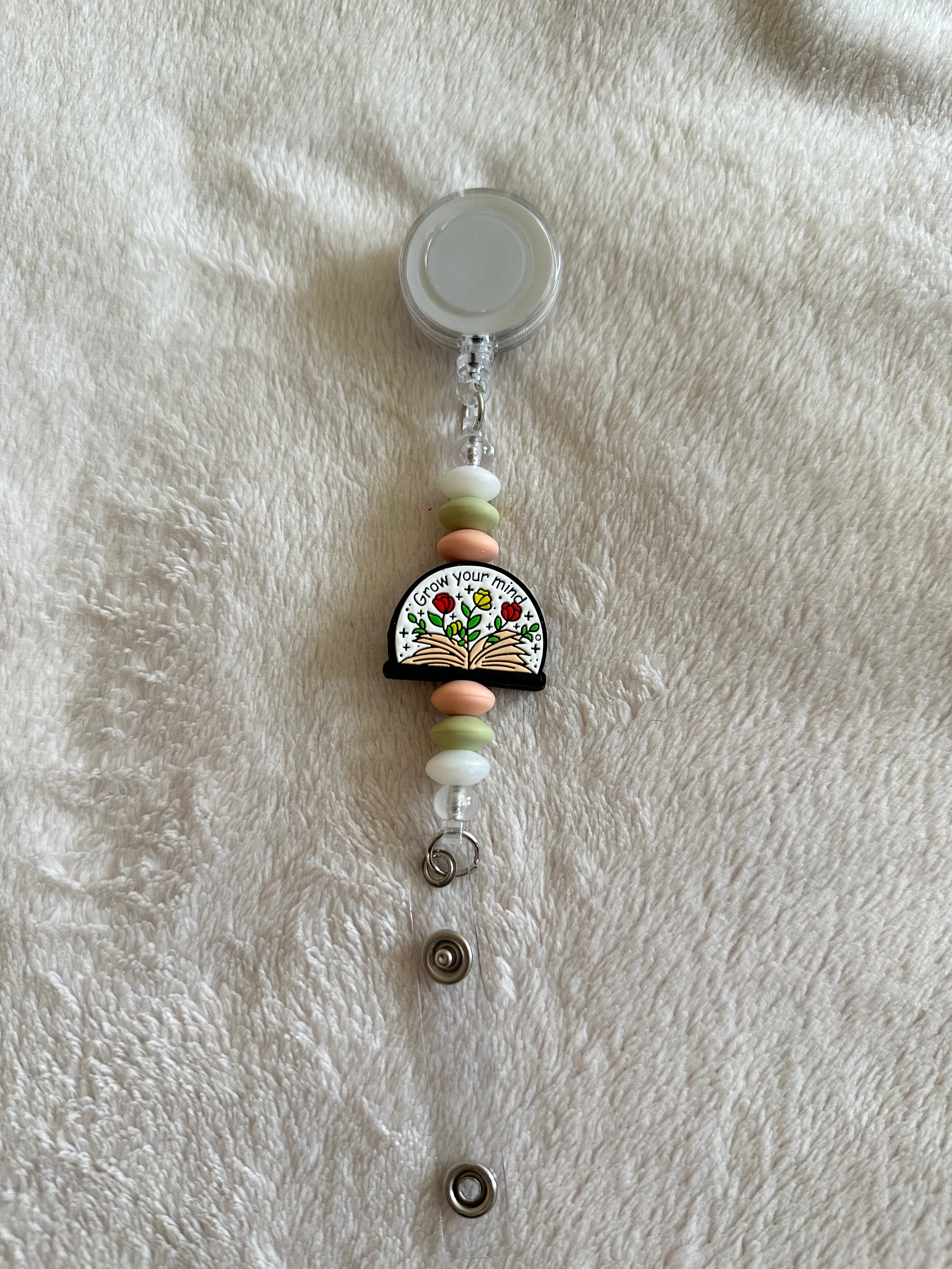 Grow your mind retractable ID holder